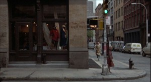 Michael Caine running on the street in SOHO