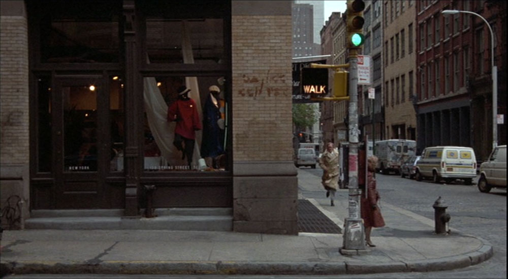 Michael Caine running on the street in SOHO