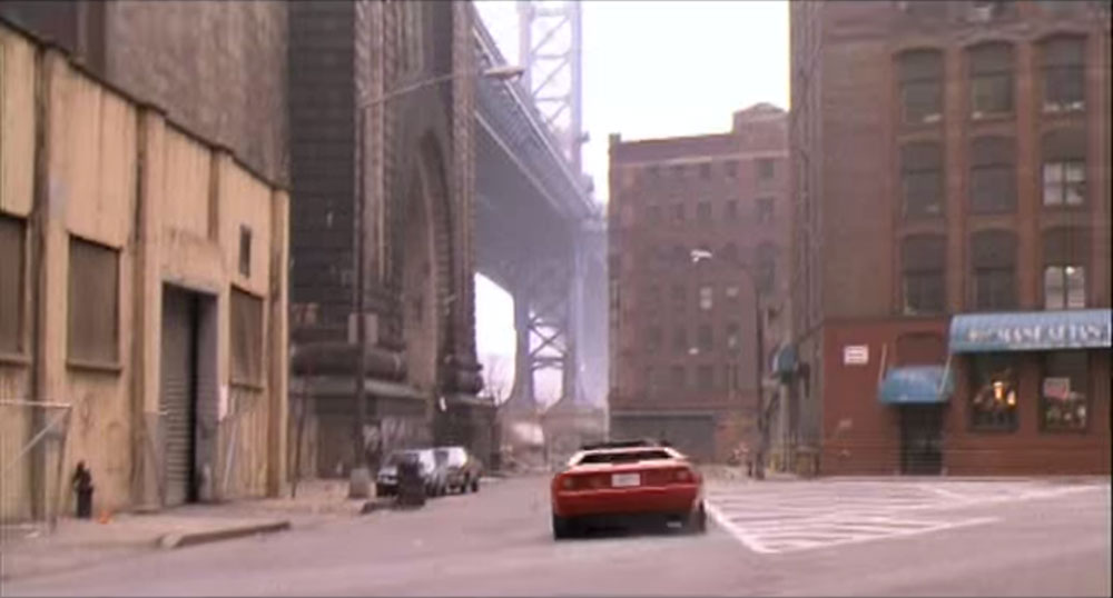 Ferrarri driving down the street