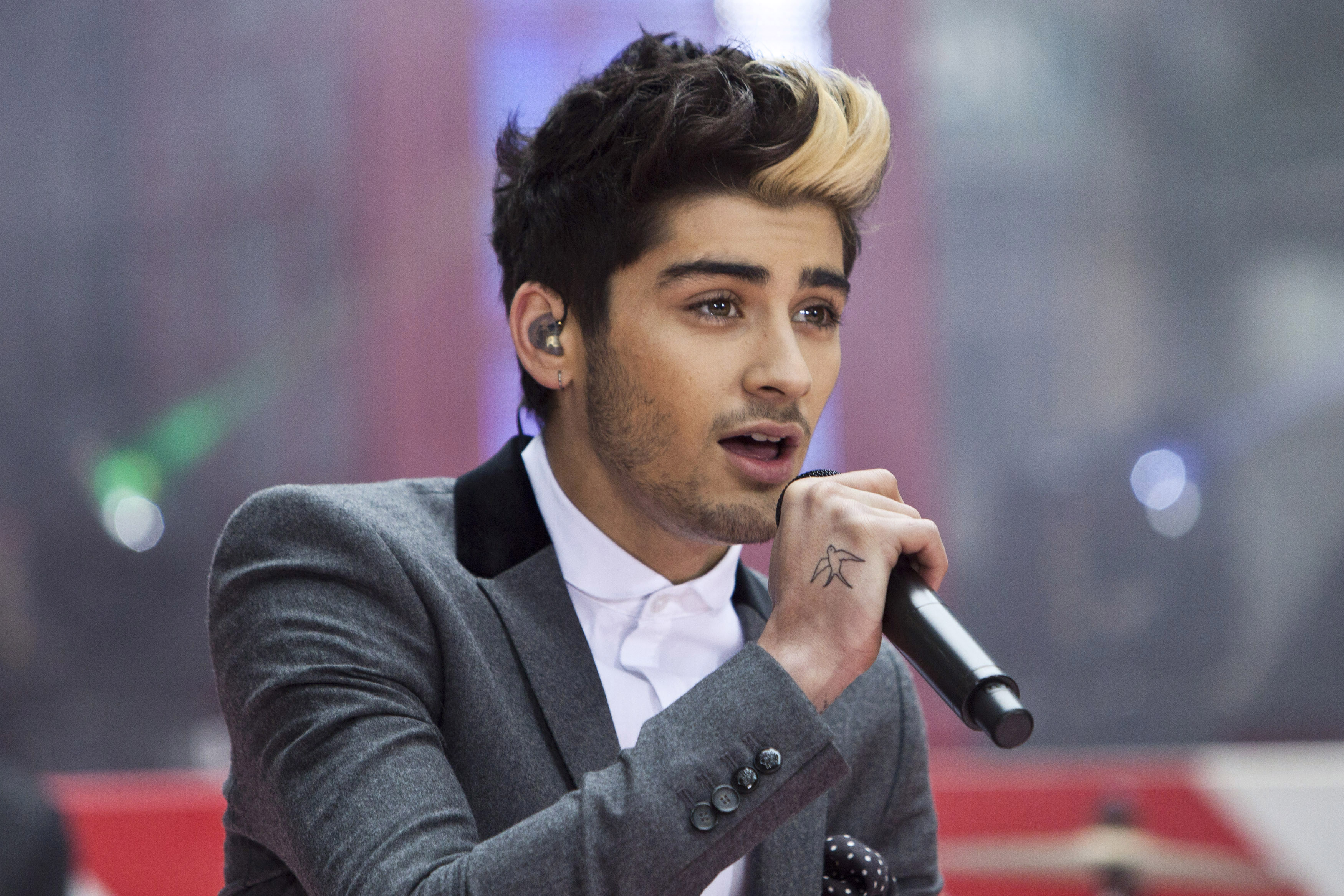 Malik performs with his band, "One Direction" on NBC's Today show in New York