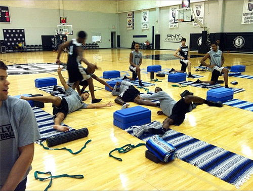 Gerald Wallace of the Brooklyn Nets must have had a hard night because he crashes, falling asleep during a team yoga session