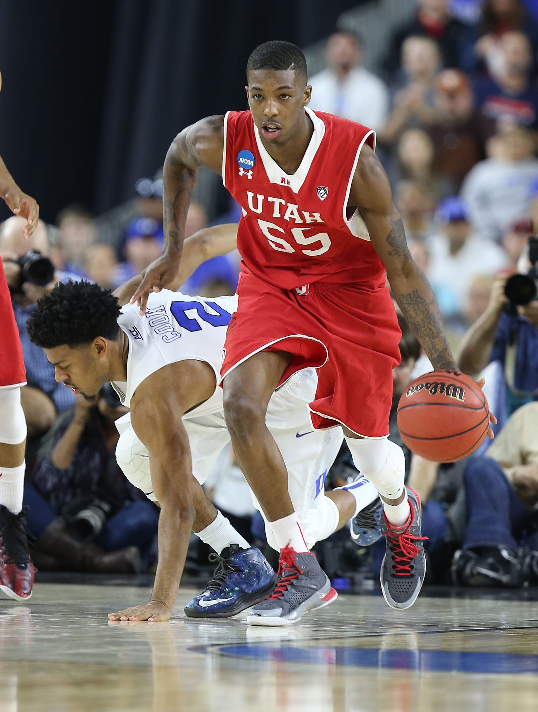 Utah Utes guard Delon Wright (55) as the University of Utah is defeated by Duke 63-57 in the Sweet Sixteen round of the NCAA Men's Basketball Tournament Friday, March 27, 2015, in Houston.