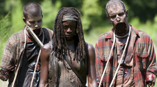 Walkers and Michonne (Danai Gurira) - The Walking Dead _ Season 4, Episode 9 - Photo Credit: Gene Page/AMC